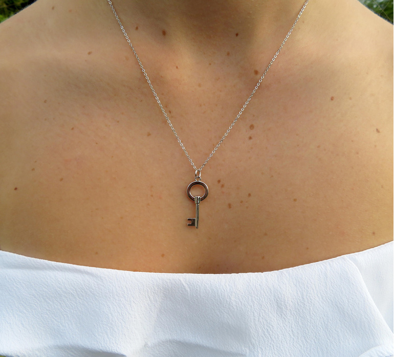 Sterling Silver Round Key Pendant on sterling silver chain.